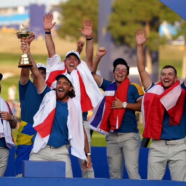 Team Europe celebrate after winning the Ryder Cup (David Davies/PA)