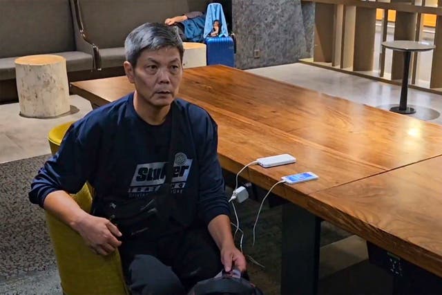 <p>In this image taken from video footage run by TVBS, Chinese dissident Chen Siming can be seen at Taoyuan International Airport’s transit lounge in Taipei, Friday, 22 September 2023 </p>